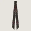 Bandeau de seda con la firma de Givenchy en varios colores