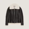 Blouson aviador de cuero y borreguillo con costuras de alta costura