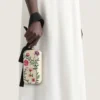 Bolso de mano de noche con bordados florales y lazo Bolso de mano de noche con bordados florales y lazo