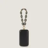 Bolso de mano de noche en piel napa con cadena Bolso de mano de noche en piel napa con cadena