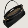Bolso grande tipo «pinch» de piel