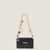 Bolso pequeño Pout de piel con cadena de dijes Bolso pequeño Pout de piel con cadena de dijes