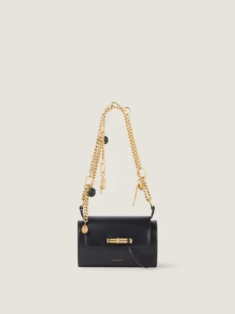 Bolso pequeño Pout de piel con cadena de dijes