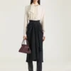 Bolso Pinch mediano en piel granulada Bolso Pinch mediano en piel granulada