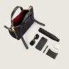 Bolso Snatch pequeño en piel granulada Bolso Snatch pequeño en piel granulada