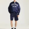 Bomber con costuras de alta costura en satén bordado con «Givenchy Paris»