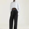 Camisa asimétrica de popelín con lentejuelas