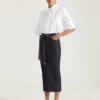 Falda midi con detalle «kickback» en denim sin tratar