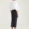 Falda midi con detalle «kickback» en denim sin tratar