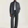Pantalones con costuras de alta costura en franela