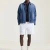 Chaqueta con costuras de alta costura en denim azul oscuro