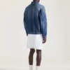 Chaqueta con costuras de alta costura en denim azul oscuro
