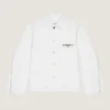 Chaqueta con costuras de alta costura en denim bordado con «Givenchy Paris»