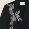 chaqueta cruzada con aberturas en la espalda, de lana con lentejuelas