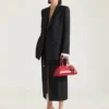 Chaqueta cruzada con aberturas en lana y mohair