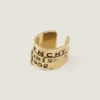Earcuff Tape de Givenchy en metal y esmalte Earcuff Tape de Givenchy en metal y esmalte