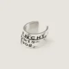 Earcuff Tape de Givenchy en metal y esmalte