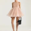 Mini vestido babydoll con volantes de nailon Mini vestido babydoll con volantes de nailon
