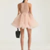 Mini vestido babydoll con volantes de nailon Mini vestido babydoll con volantes de nailon