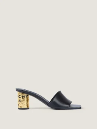 Mules con tacón y cinta de cuero