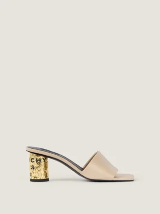 Mules con tacón y cinta de cuero