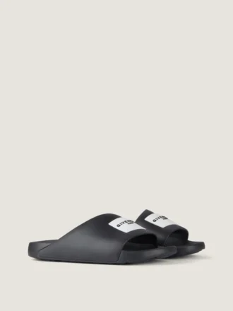 Mules con tiras de la línea Label en caucho Mules con tiras de la línea Label en caucho