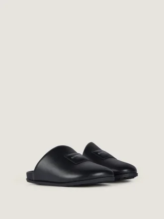 Mules planas de la línea Label en piel napa