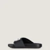 Mules planas Label de goma Mules planas Label de goma