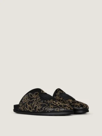 Mules planos Label de piel con tachuelas