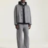 Pantalones cargo con costuras de alta costura en denim de espiga