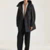 Parka con costuras de alta costura