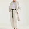 Chaqueta corta con cinturón de algodón y lana