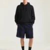 Sudadera con capucha de felpa con costuras de alta costura y estampado de claqueta