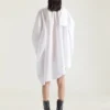 Vestido camisero asimétrico de algodón con detalle de lazo