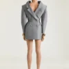 Vestido entallado con efecto «del revés» en lana