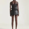 Vestido mini tipo bustier de estilo motero en piel Vestido mini tipo bustier de estilo motero en piel