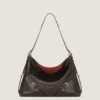 Voyou Bag mediano de piel brillante Voyou Bag mediano de piel brillante