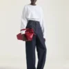 Voyou Bag mediano de piel brillante Voyou Bag mediano de piel brillante